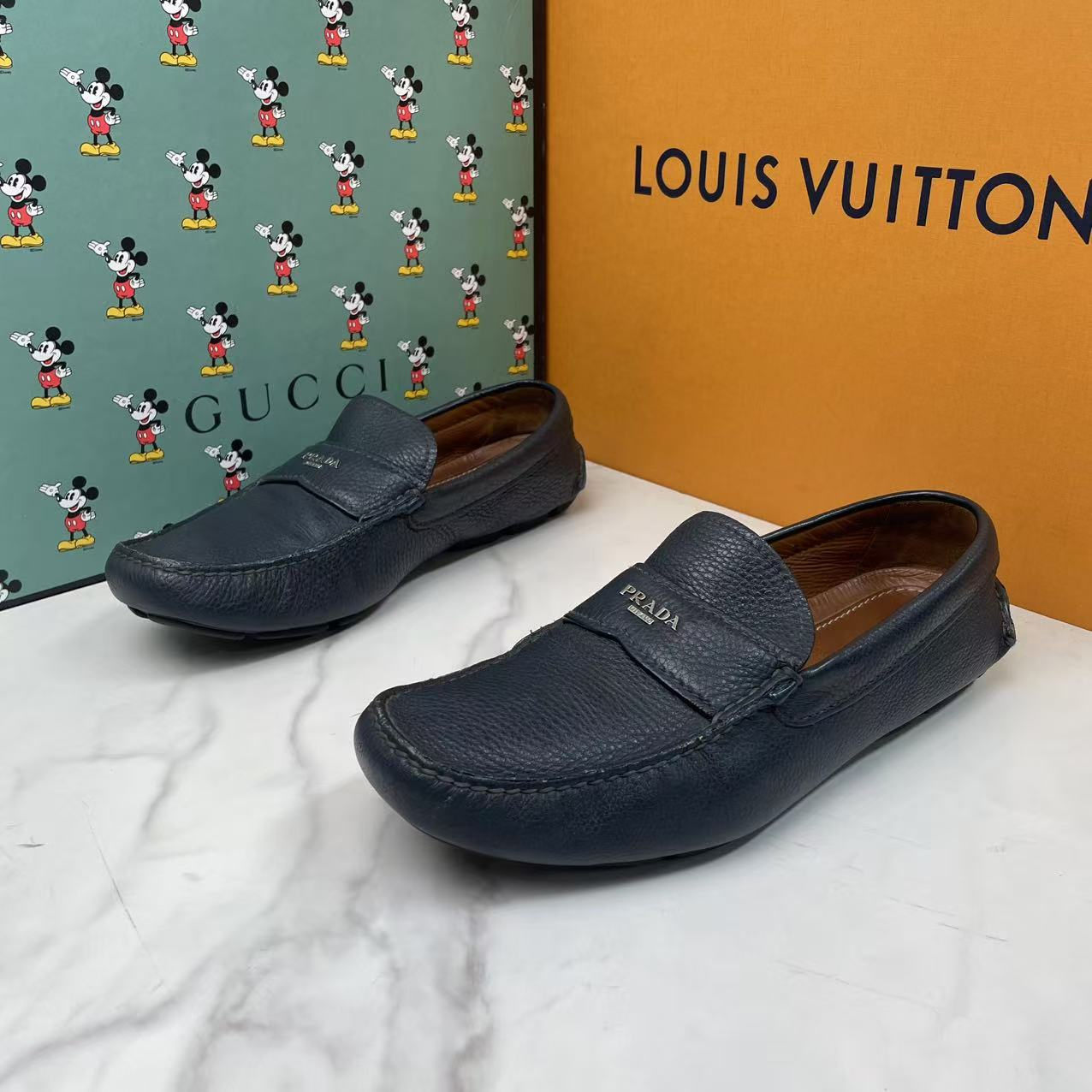 95新 Prada/普拉达 蓝色荔枝纹小银扣潮流百搭休闲豆豆鞋/41.5码