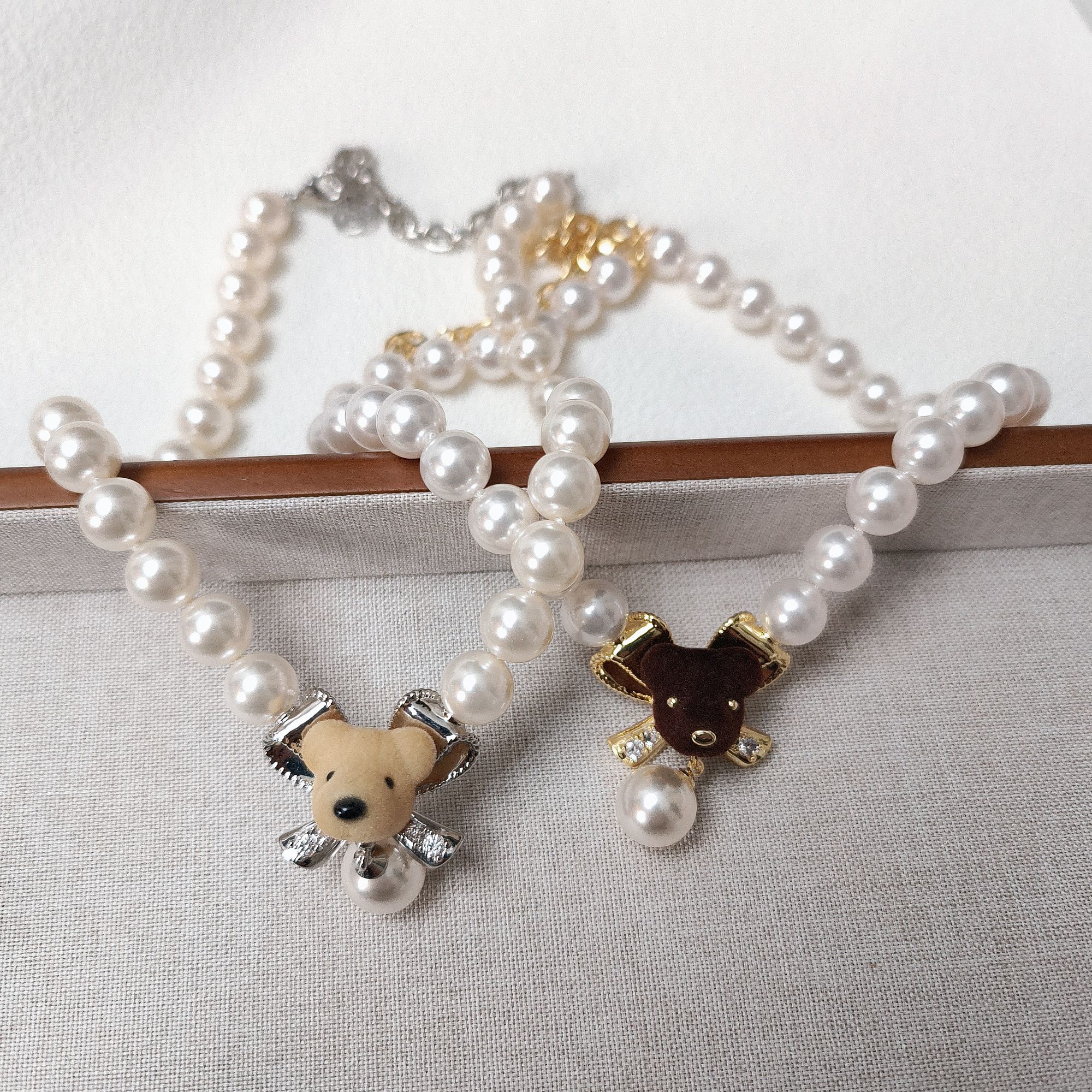 个性百搭款 珍珠蝴蝶结小熊头项链 9005