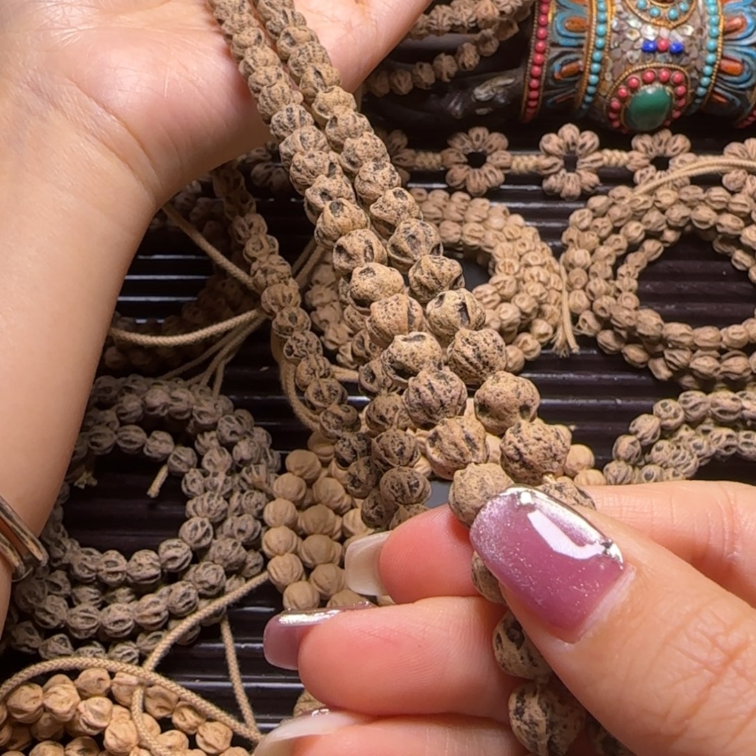 爱***己柏香籽/百香籽吊坠