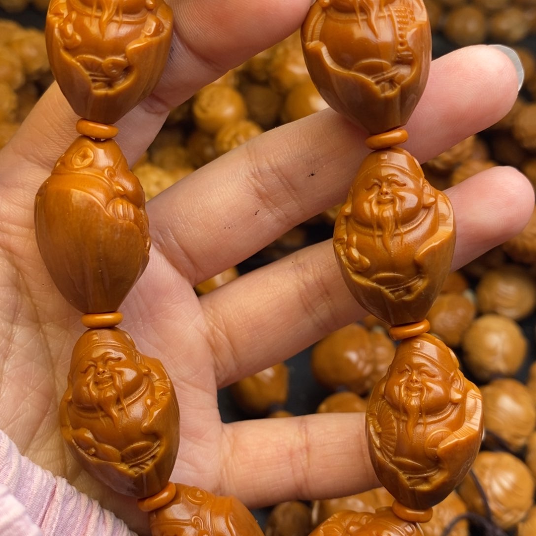 橄榄核吊坠包衣财神1.7+