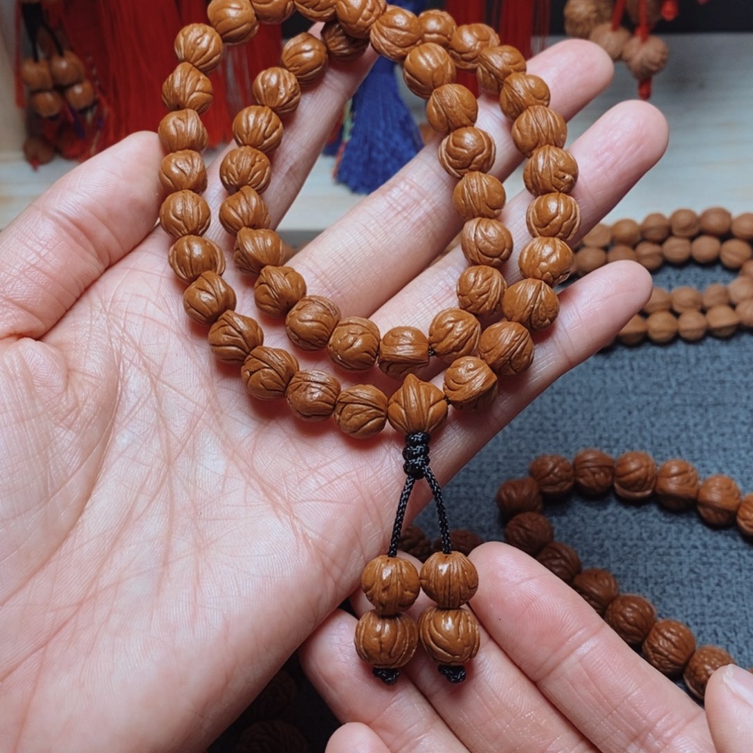 桃核吊坠桃枭手持1