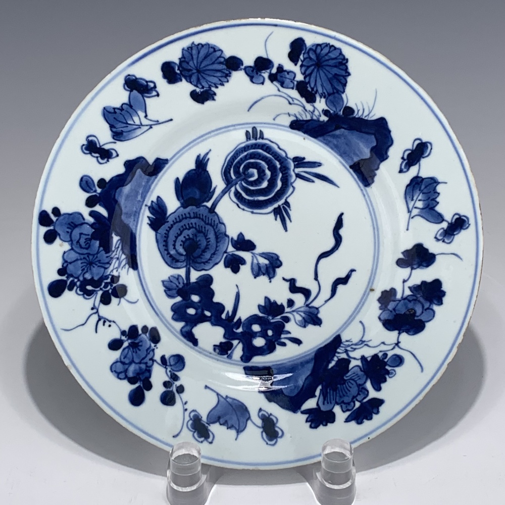 lot 12102 清雍正 青花洞石花卉纹盘