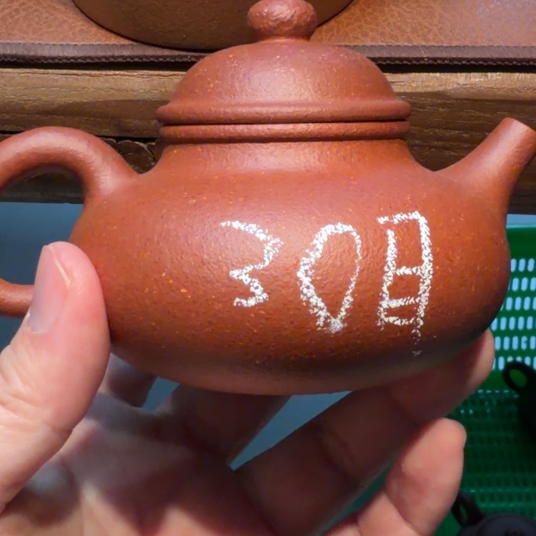 茶杯紫砂微瑕的壶不退