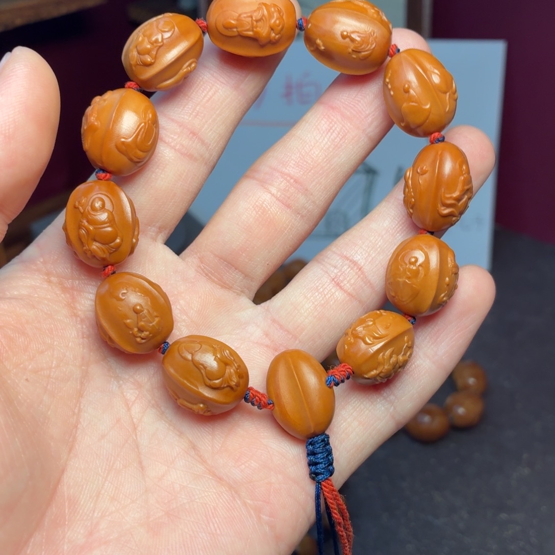 手串橄榄核三面无相佛