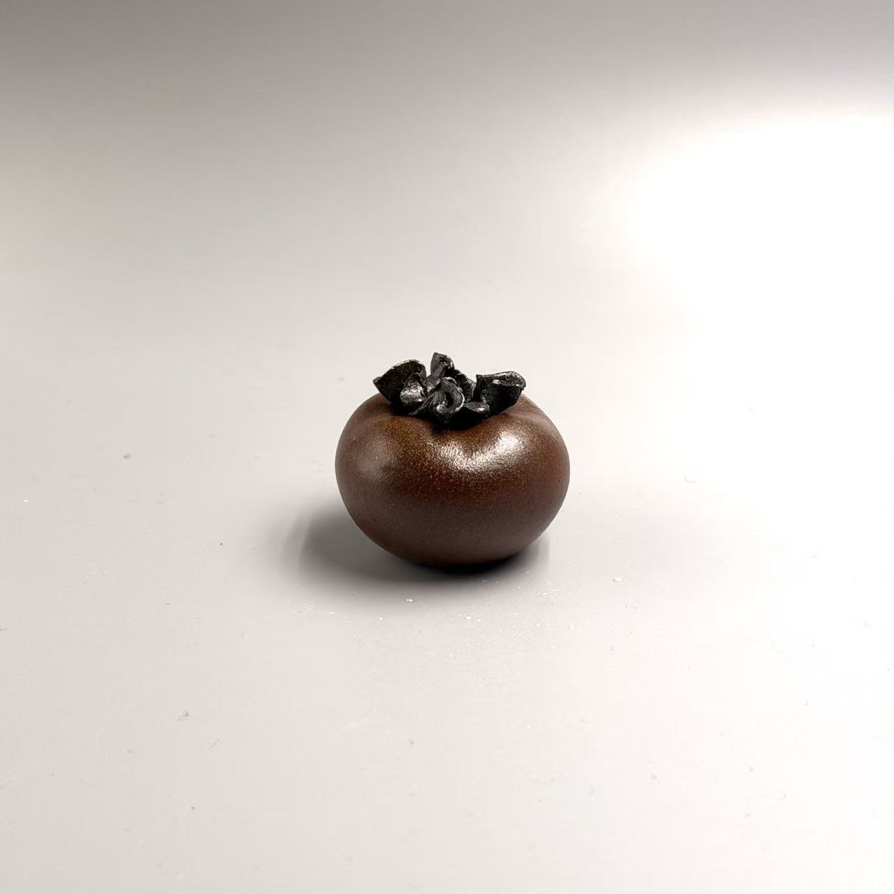 甄选《添一把火-柴烧柿子》摆件