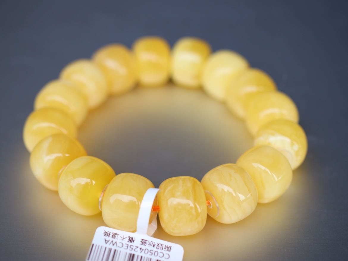 【俄料】17*13mm 奶咖妖花浓蜡蜜蜡墩子手串 42；1