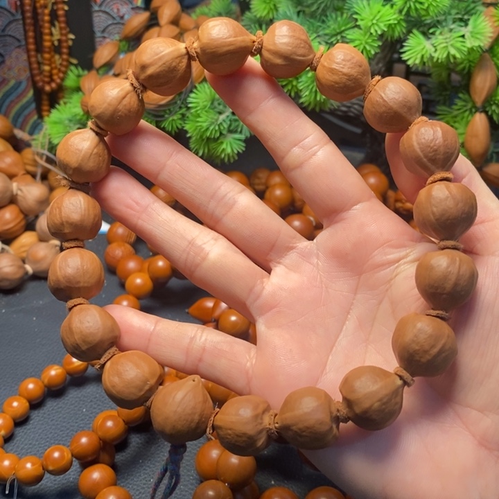 橄榄核手串1.7*1.9蜜桃臀