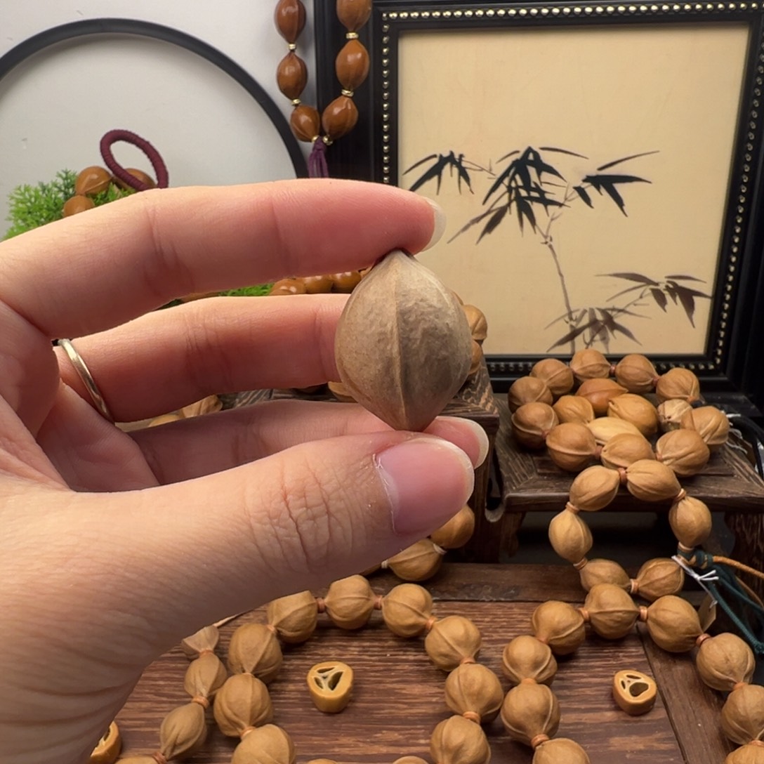 *****橄榄核手串21.29三通1颗