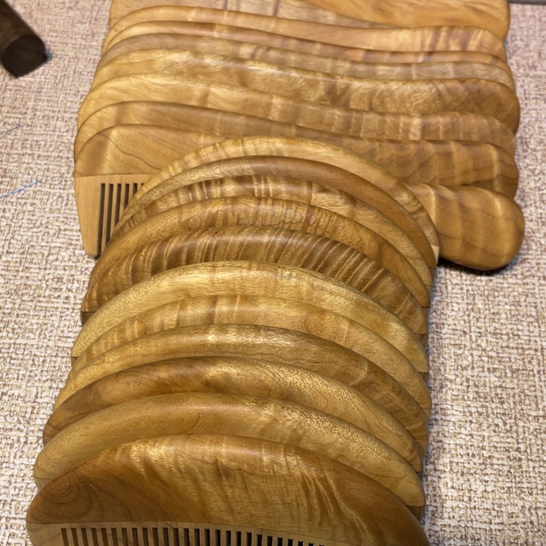 帝***木其他楠木（金丝楠）梳子
