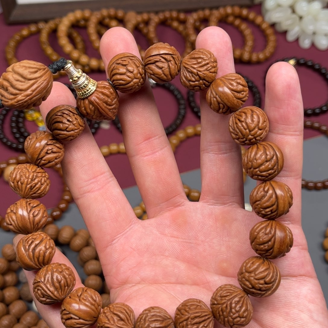 玉***夫菩提根/象牙果手串龙纹桃核手持