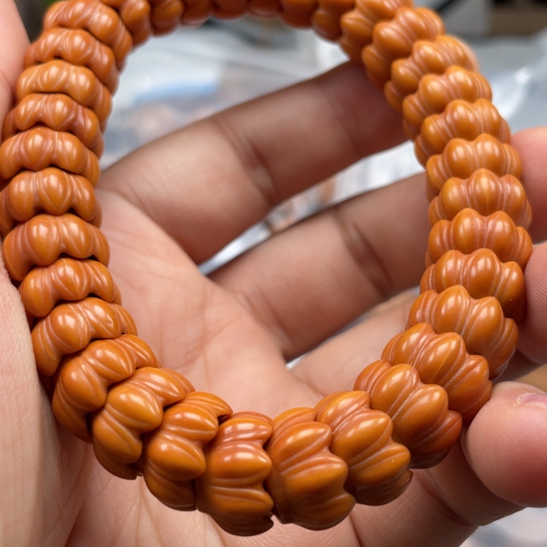 扁***言橄榄核吊坠你说什么