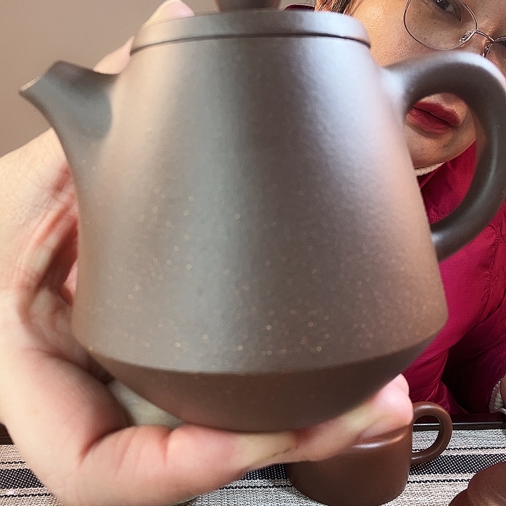 紫泥茶壶临****?儿子设计