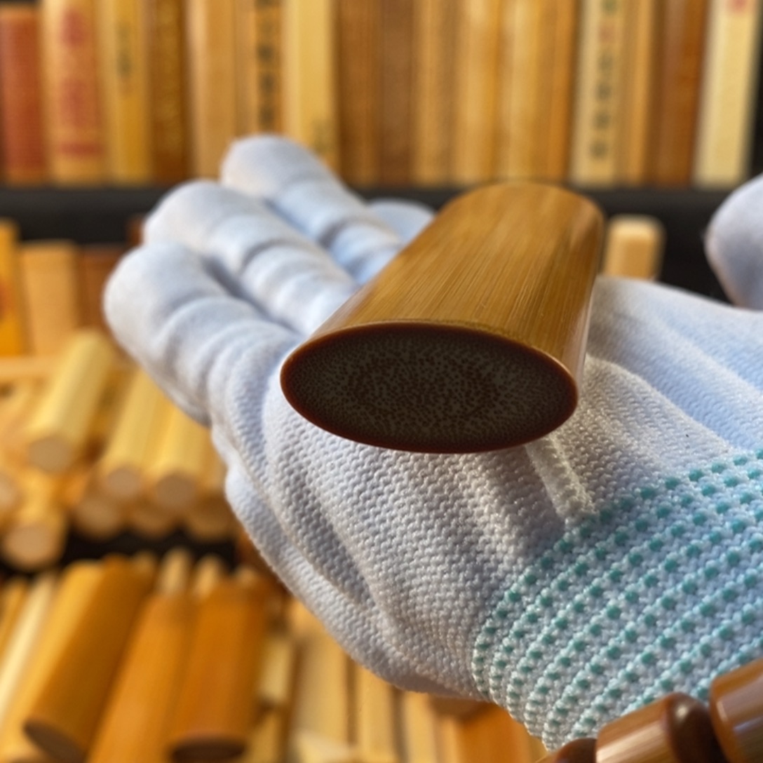 跑***）竹红皮椭扁手把件