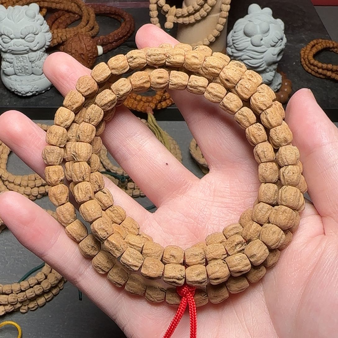 曳***落柏香籽/百香籽手串有棱有坑