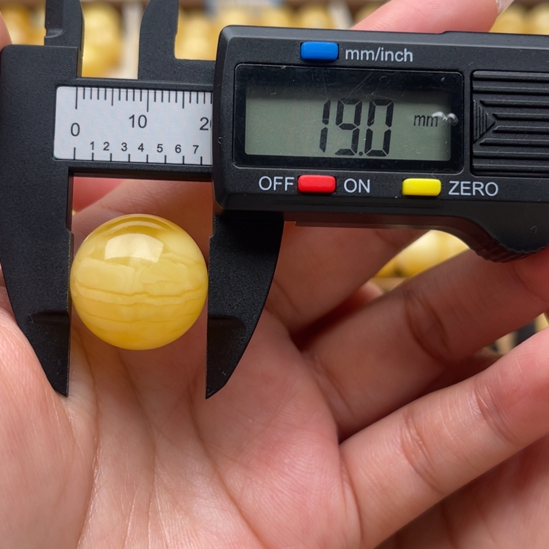 琥珀未镶嵌裸石蜜蜡圆珠笑