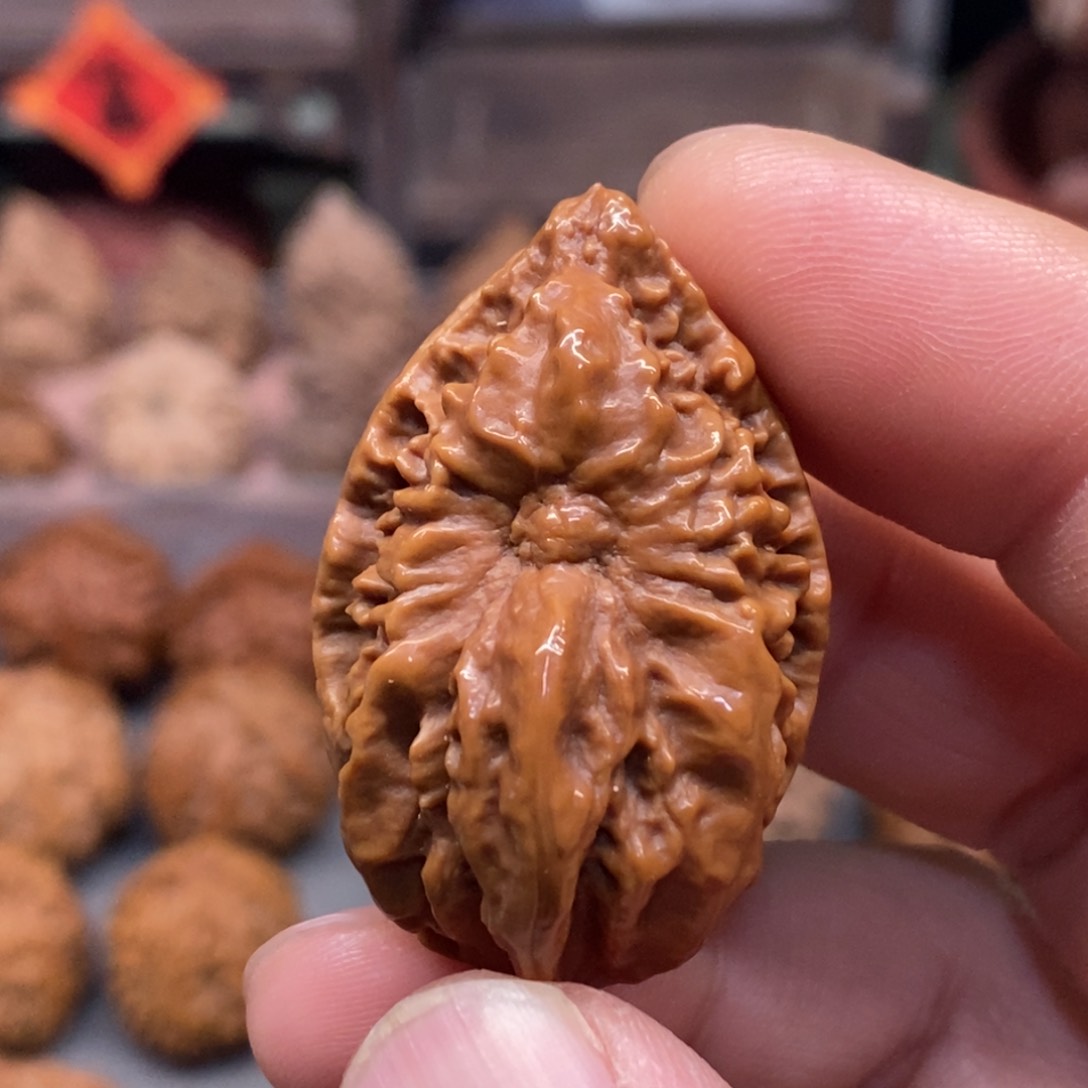 文玩核桃把件双面佛光普照