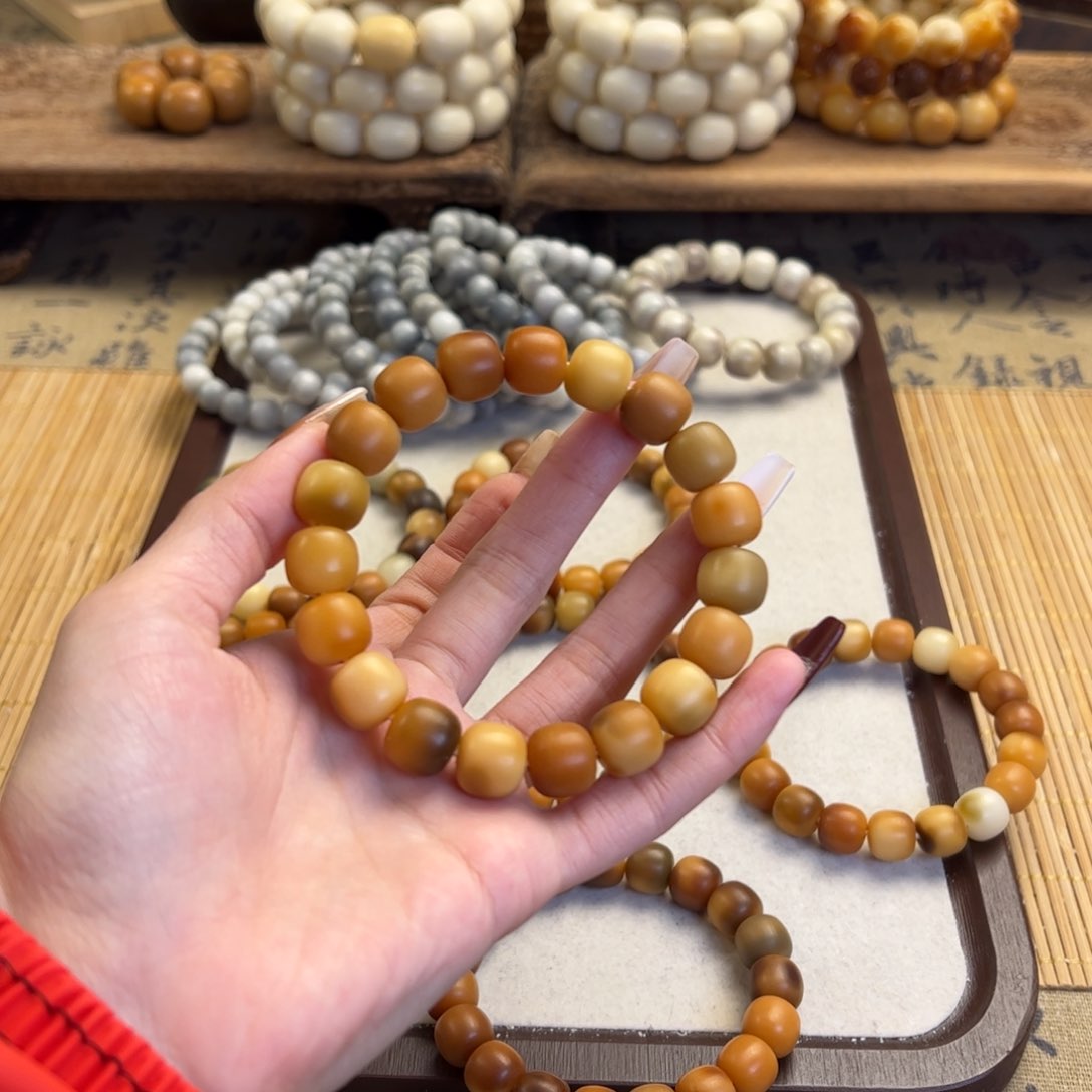 菩提根/象牙果手串哆****…111