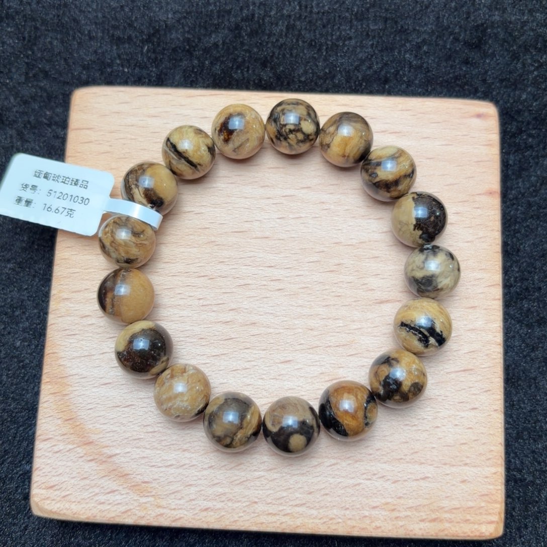 琥珀未镶嵌珠宝奇石12mm黑黄花根蜡