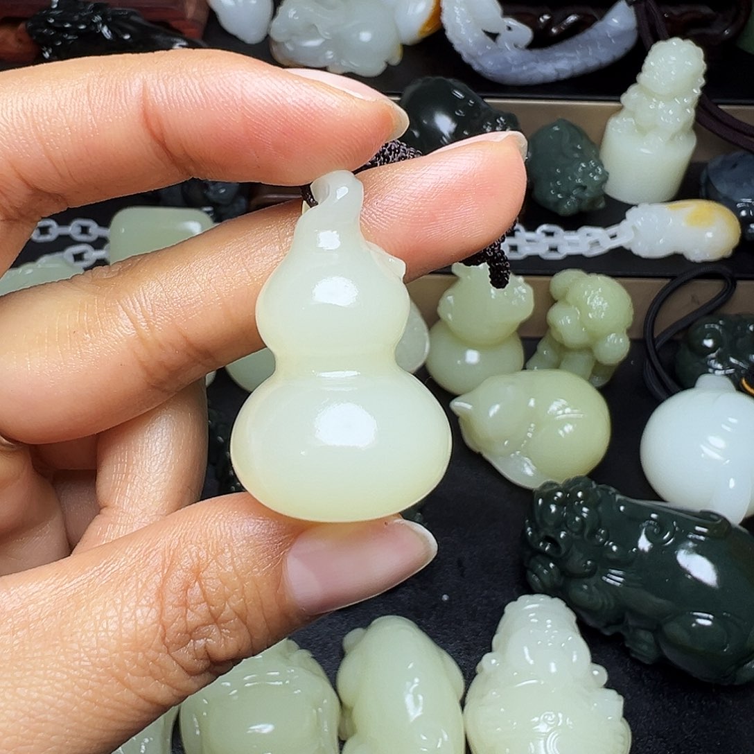 吴***龙软玉未镶嵌把件新疆天然精品料子