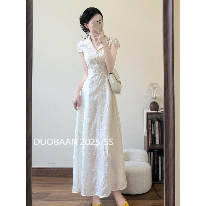 今年气质白色刺绣连衣裙女2025夏季度假风法式小众掐腰气质长裙子