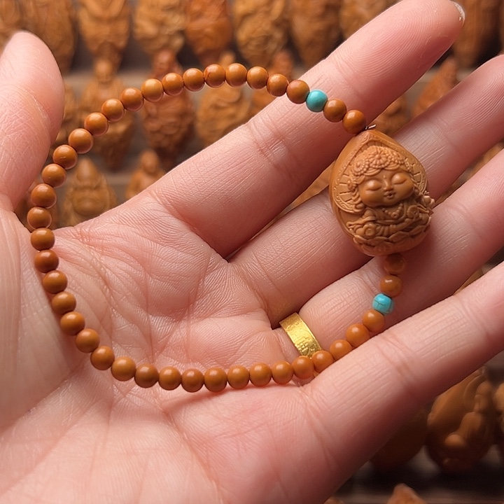 橄榄核吊坠删*韩看勒