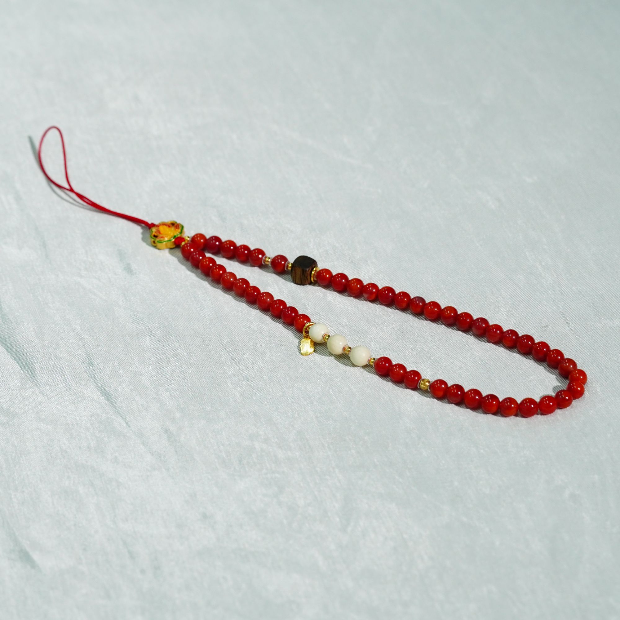 【不二】牛血红-川料九口南红DIY圆珠手机挂4.5mm（多样性发）