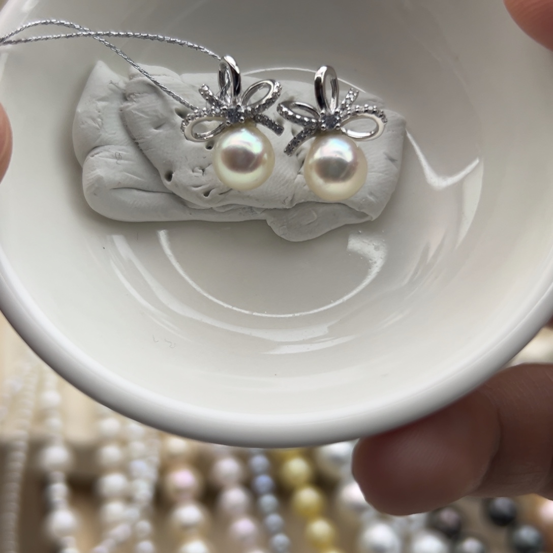 银S925镶嵌耳饰海水珍珠7.6mm海水Ak蝴蝶结耳钉