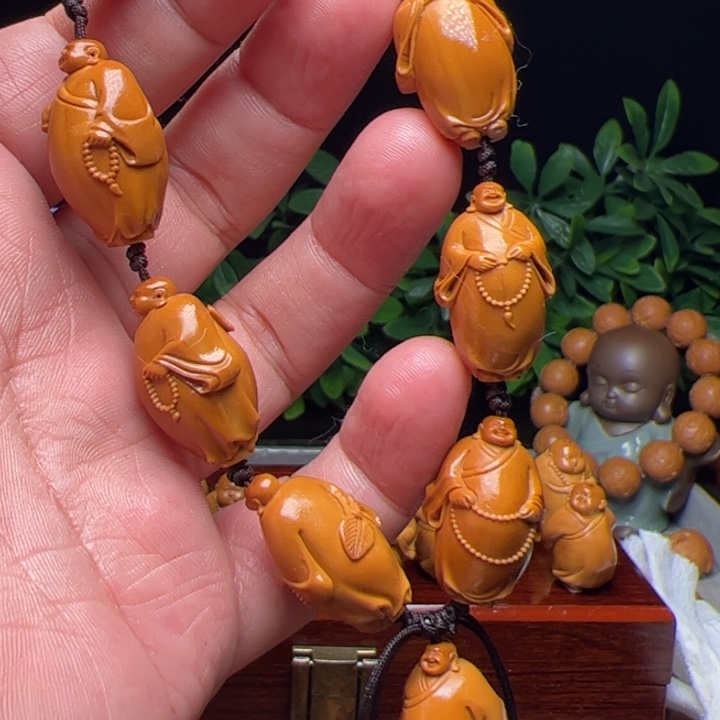 橄榄核吊坠括****弧橄榄核