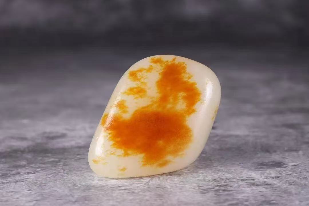 新疆和田玉黄皮手把摆件