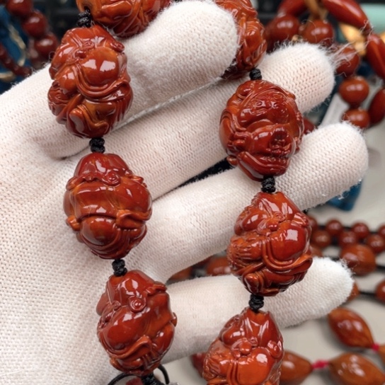 橄榄核吊坠鑫****衣橄榄核