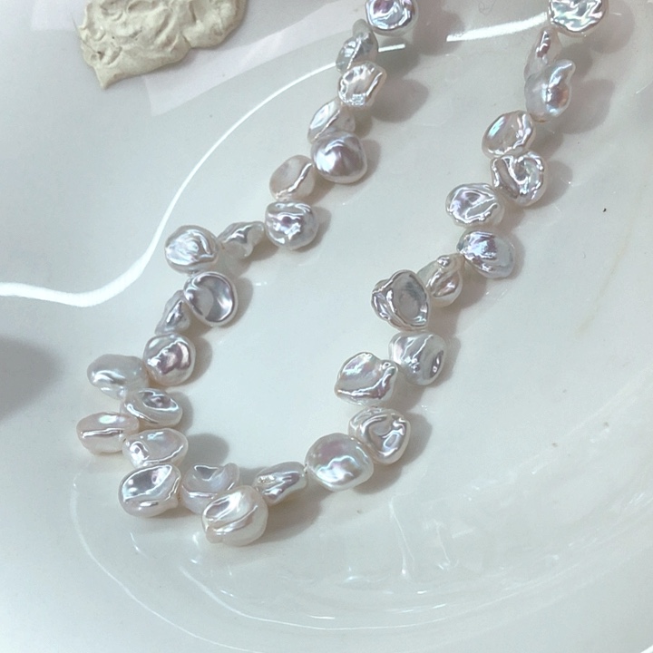 璃***儿银S925镶嵌淡水珍珠项链