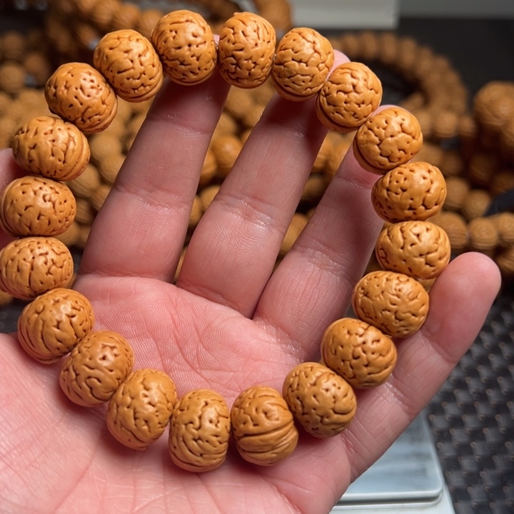 桃核手串飞****腿树王纽扣