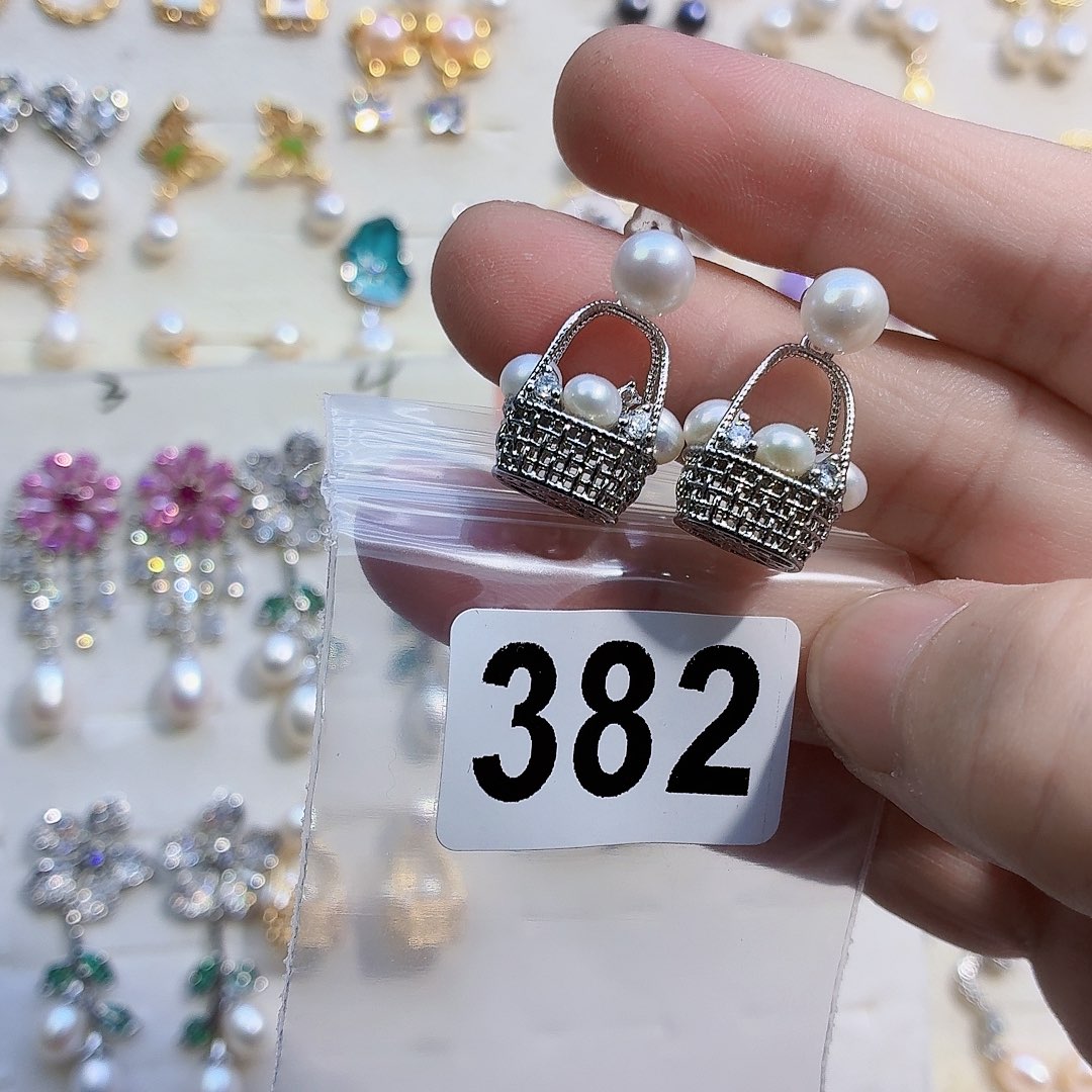 愤***饭淡水珍珠耳饰合金