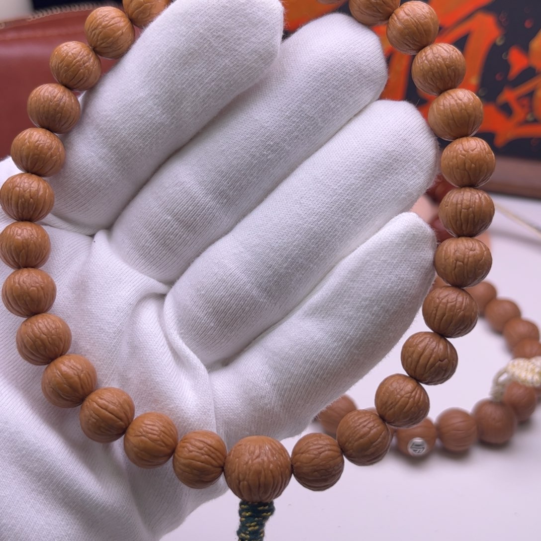 辉***)猴头核桃吊坠11大凤羽强迫症