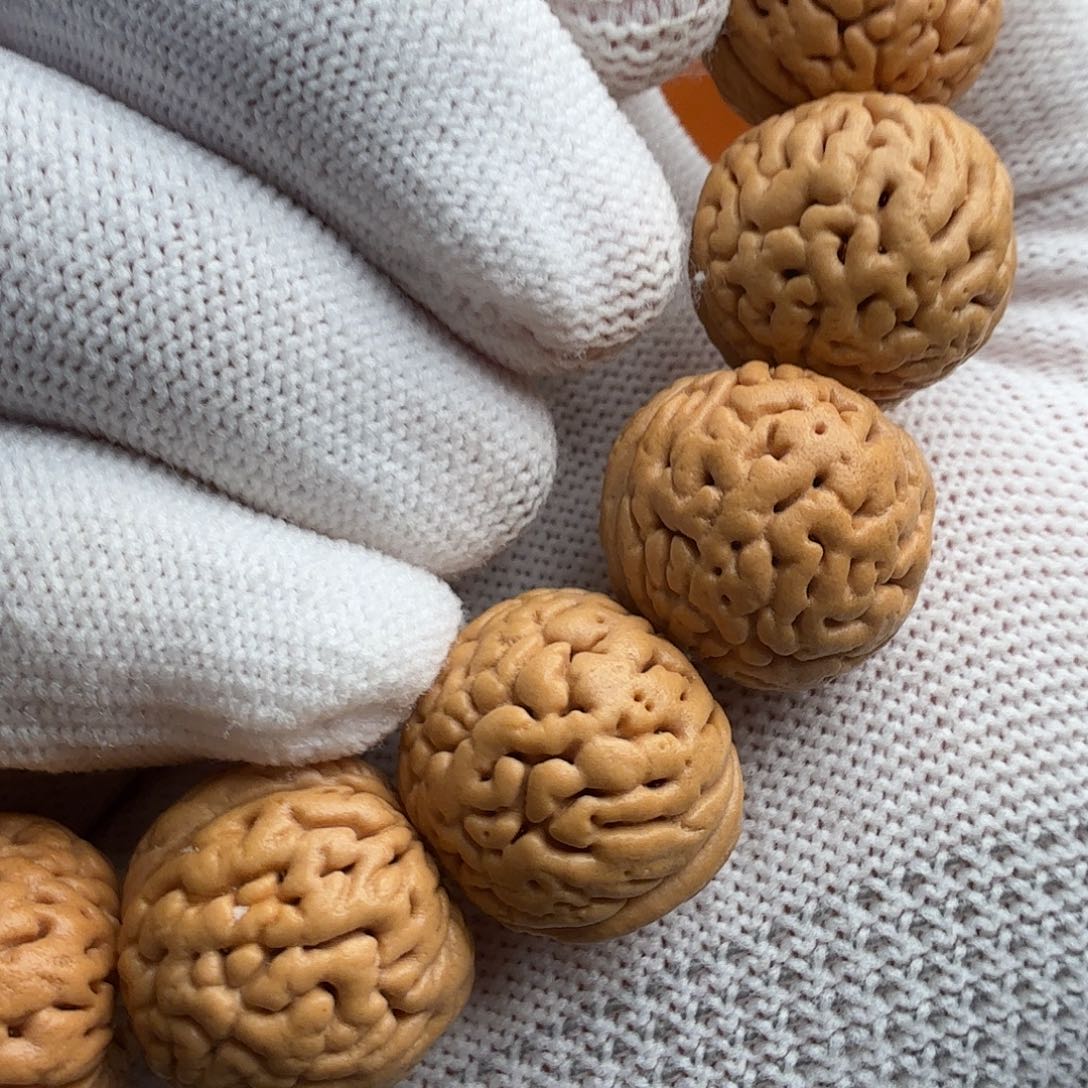 吊坠桃核盘锦爆肉