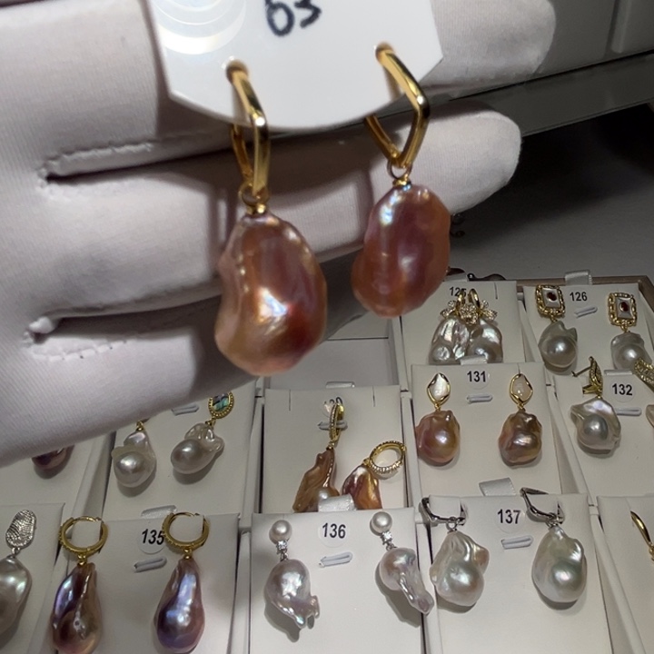 淡水珍珠耳饰银S925镶嵌哈***哈