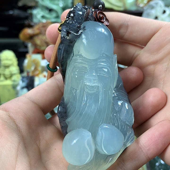 岫玉手把件未镶嵌酱**哥