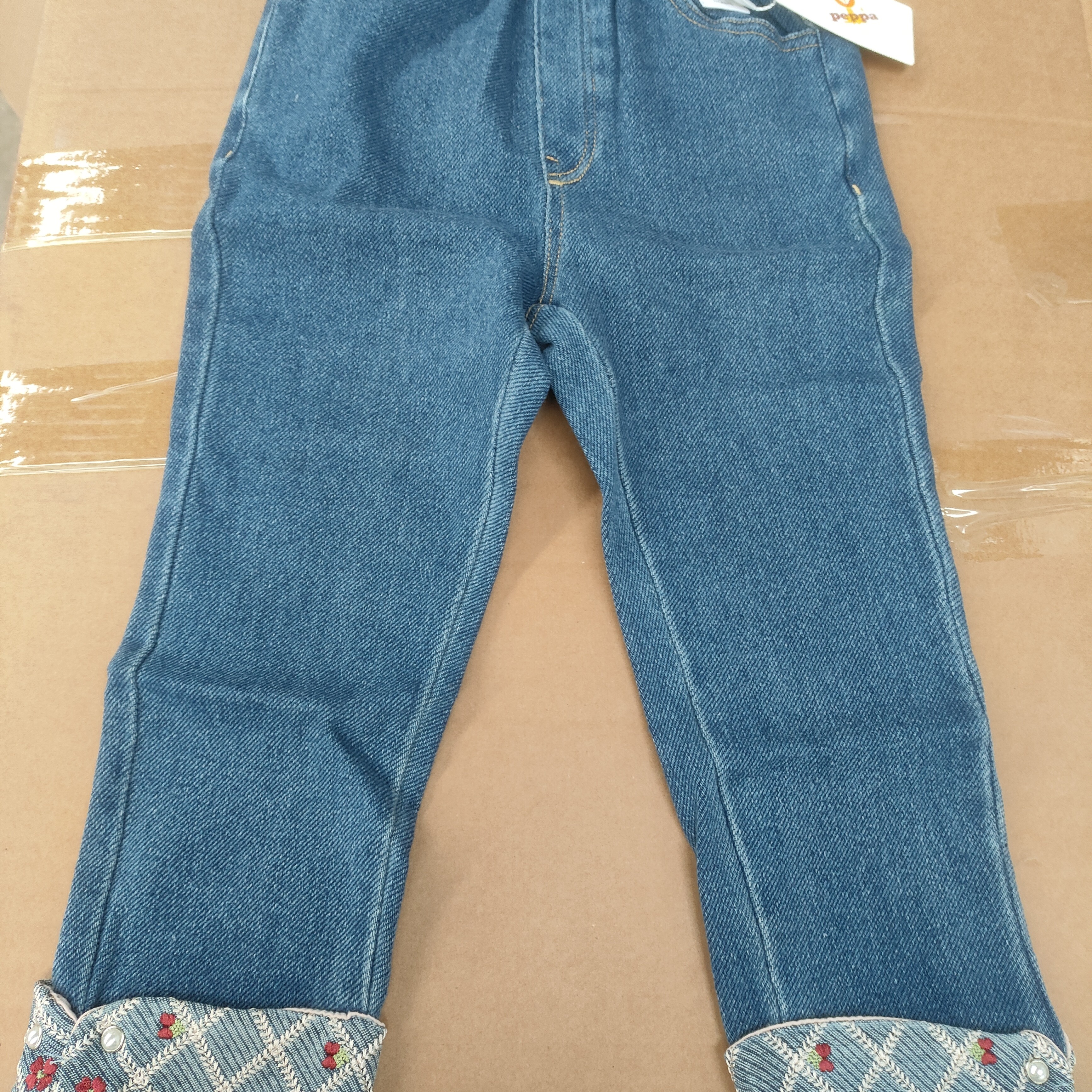 女宝花苞裤腰牛仔裤