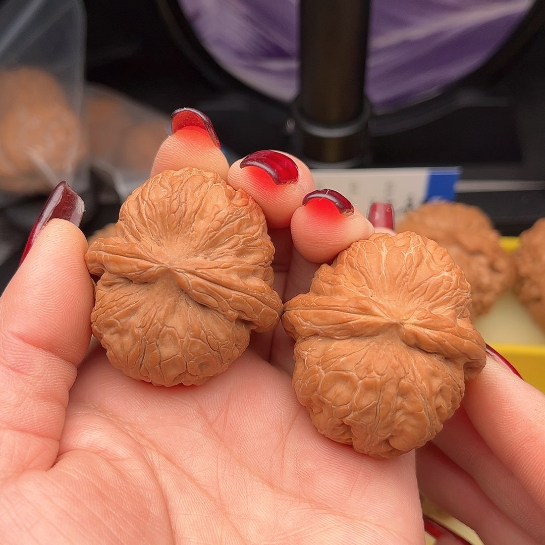 文玩核桃把件元宝全品有水尖42