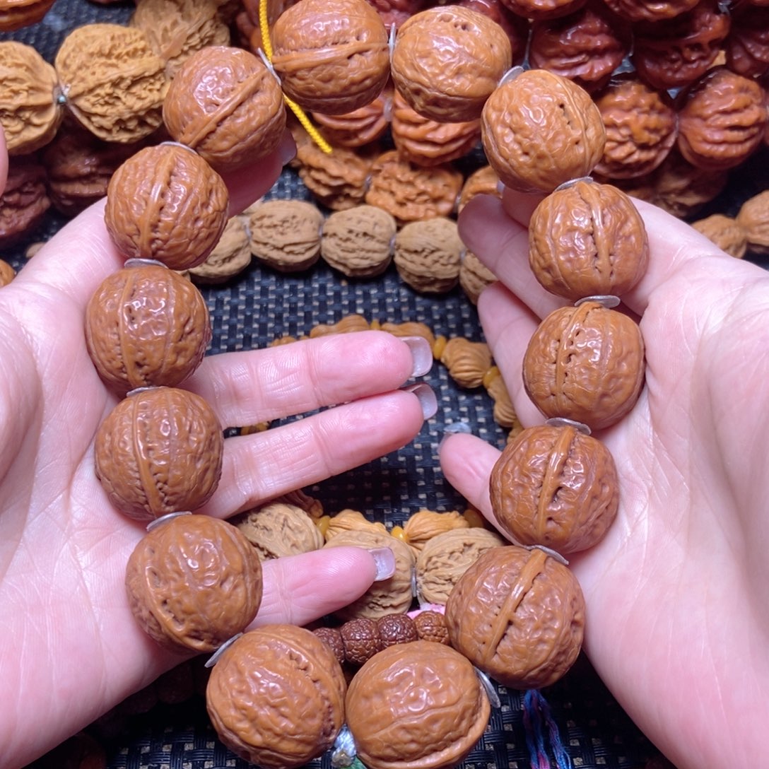 冉***乐文玩核桃手串光头足球手串