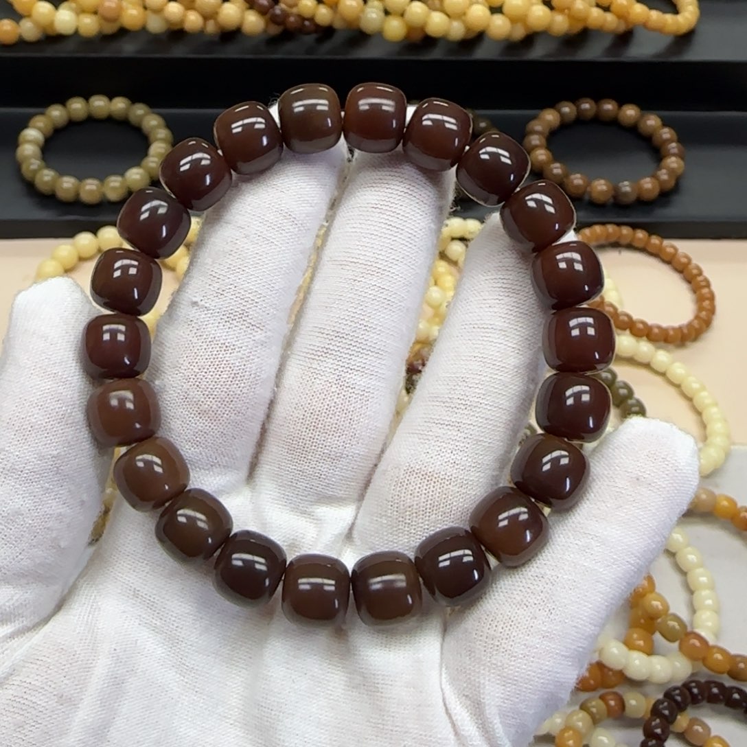 *****菩提根/象牙果手串10*11 黑衣 5年