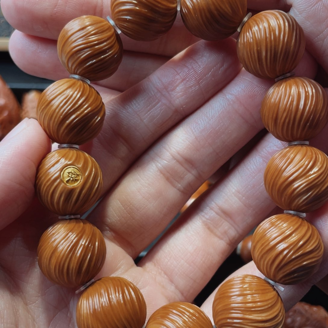 橄榄核吊坠定风珠