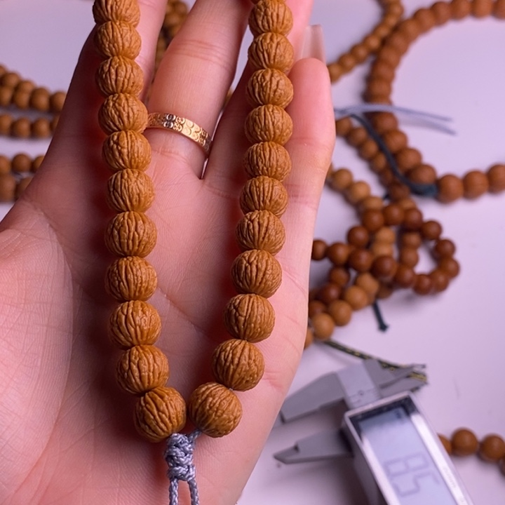 P***x核桃手串/手链麒麟凤羽