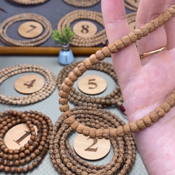 柏香籽/百香籽手串小****匠