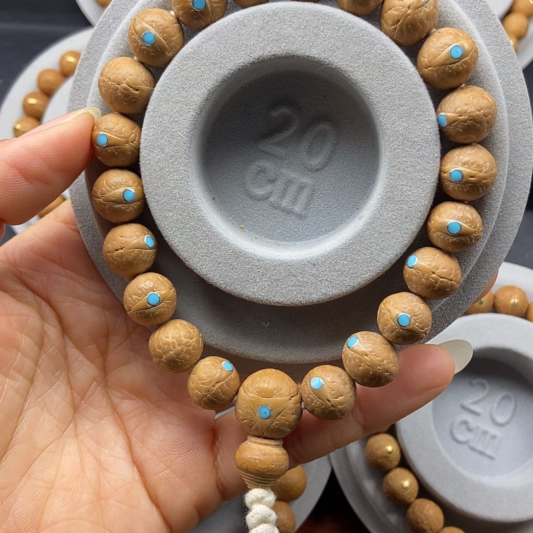 手串凤眼菩提12.5➕松，25新籽