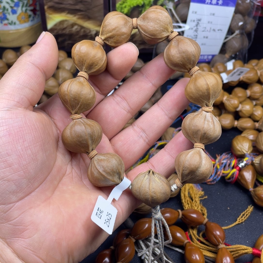 民***人手串橄榄核25x25mm