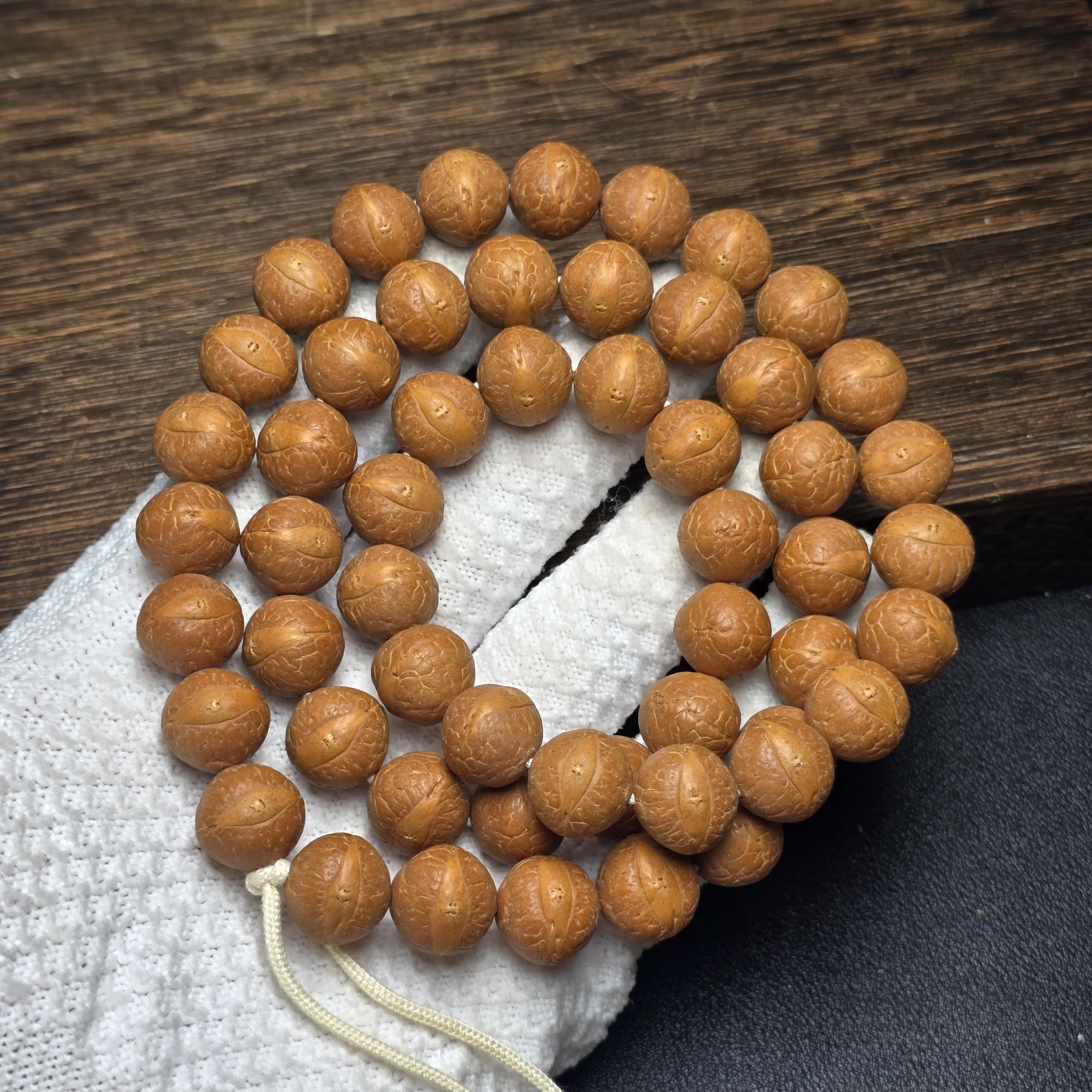 尼泊尔凤眼菩提-半挂54颗系列-尺寸14-半实心定制款货号b12