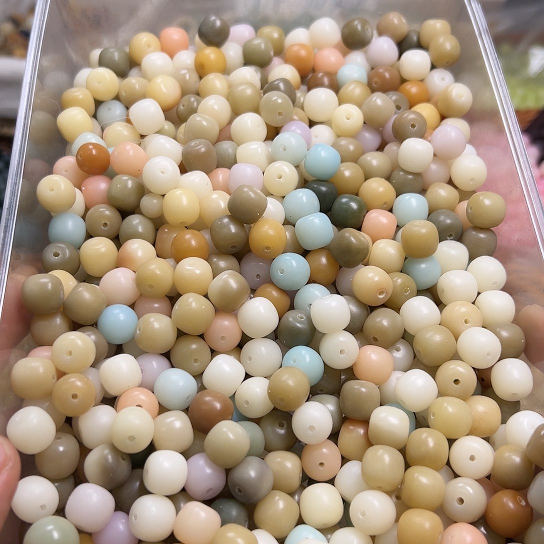 菩提根/象牙果吊坠700颗锅底桶珠混装