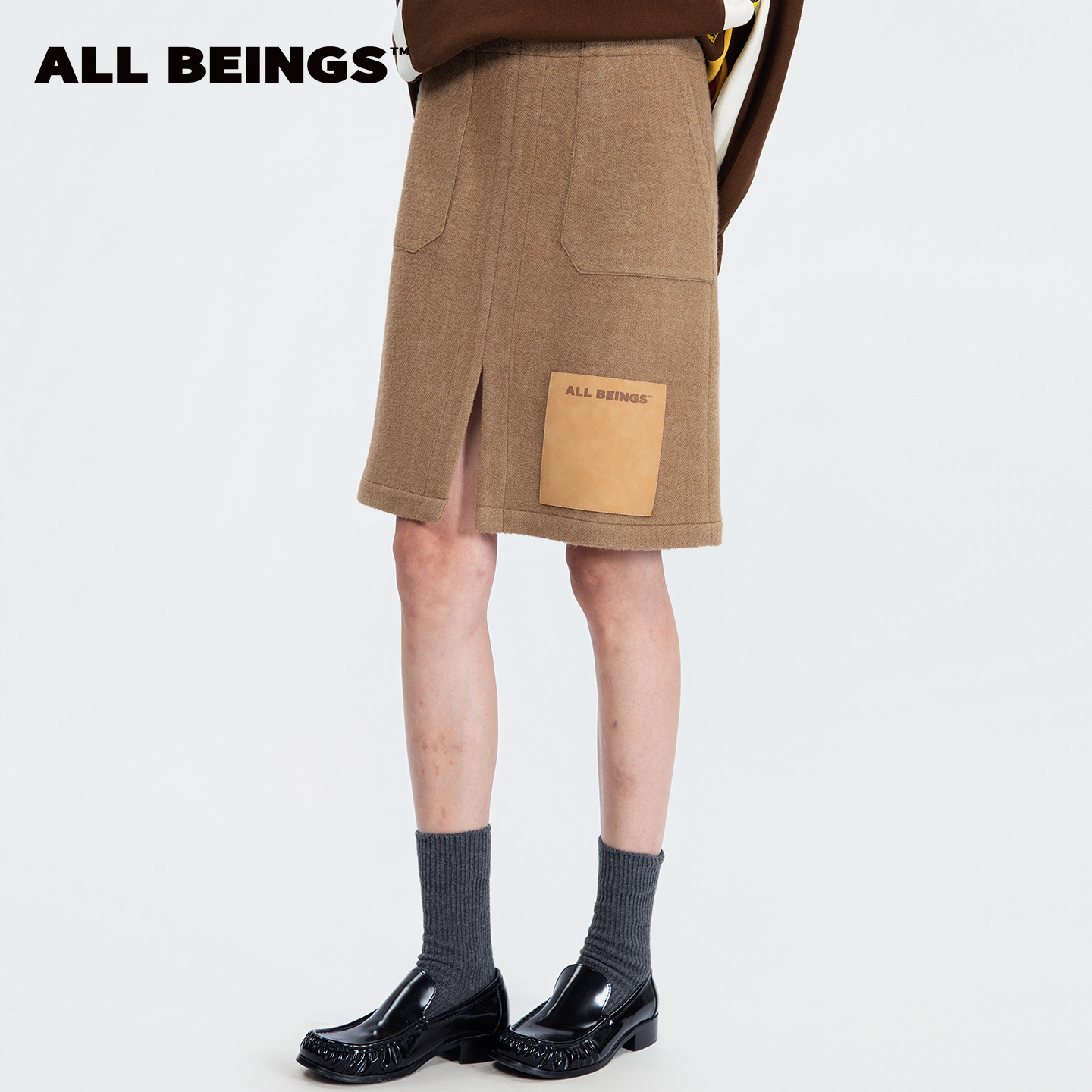 ALL BEINGS25年秋冬氛围感巴恩风卡其皮标直筒开衩羊毛裙女
