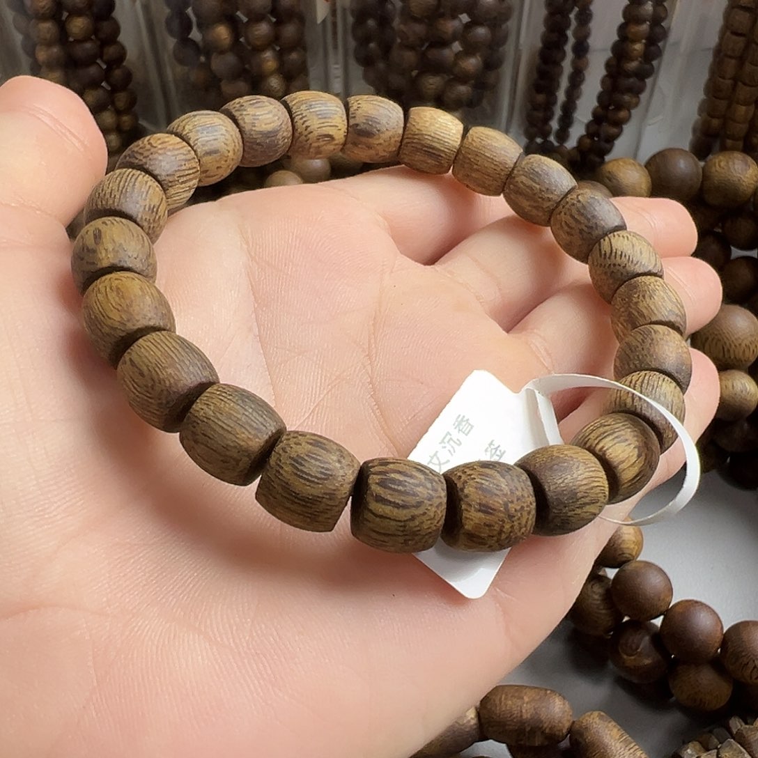 万***行沉香沉香碎屑奇楠乌身高油脂沉水浮卡9鼓珠单圈8.5克